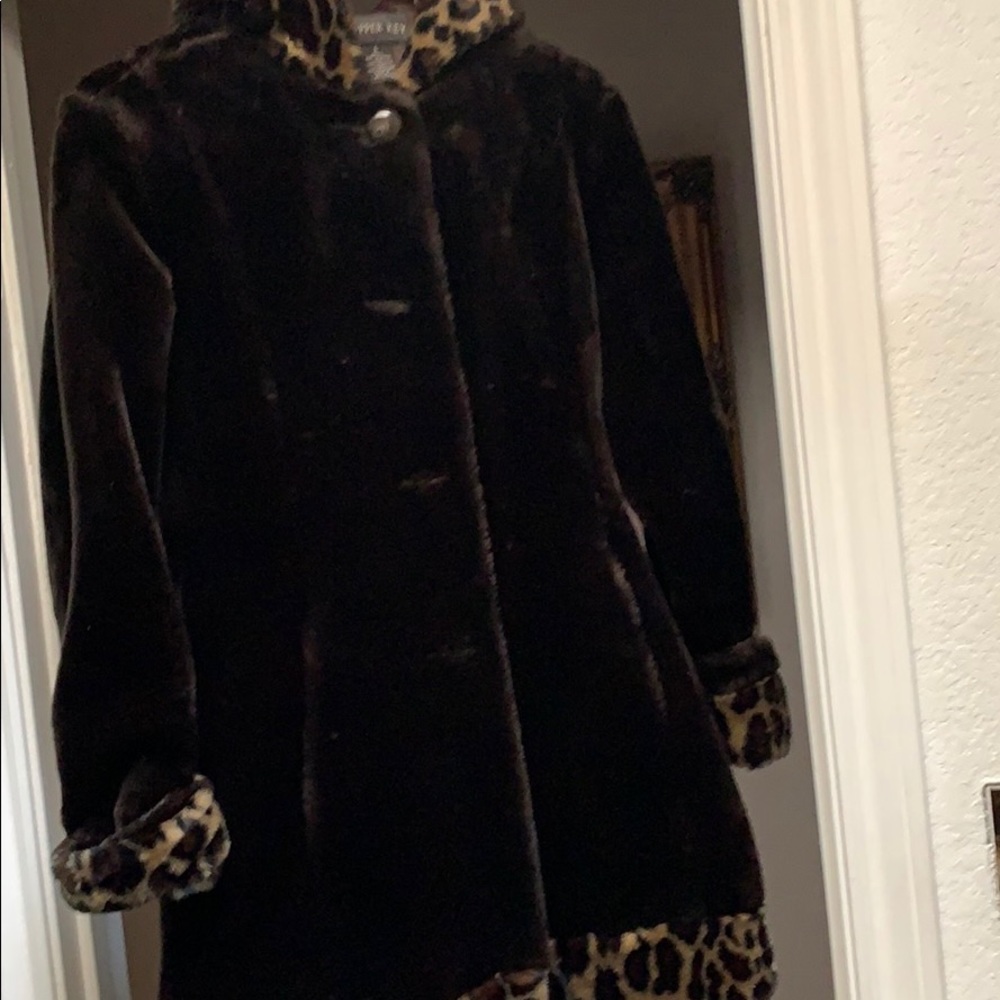 Dark brown girls coat for buttons in the front